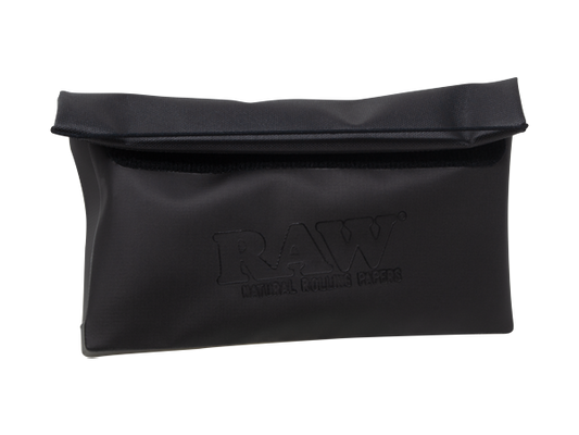 Store your stuff! Discrete, smell-proof, water-proof black pouch with flexible roll enclosure folds flat. It’s RAWdaciously non-descript.Raw Flat Pack Pouch