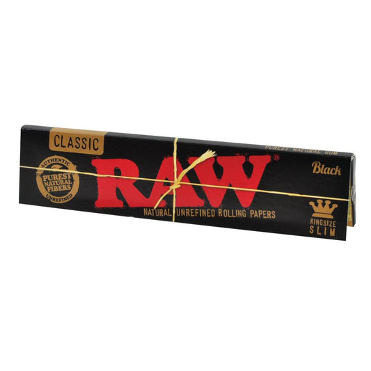 RAW Black Kingsize are designed for the highest end smokers who prefer a longer smoke. This unique artisan paper is produced in the Benimarfull region of Spain where the dry Valencian winds make humidity optimally low. RAW paper is made from natural plants with zero burn additives.  RAW Black is so thin that it allows you to truly taste your terps! RAW Black was created for a new generation as the next level of top shelf smoking materials. It’s like a Ferrari, it only runs on premium gas!